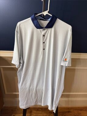 Greyson White Polo w/ Navy Contrast Collar & blue micro-design. Cabot Logo